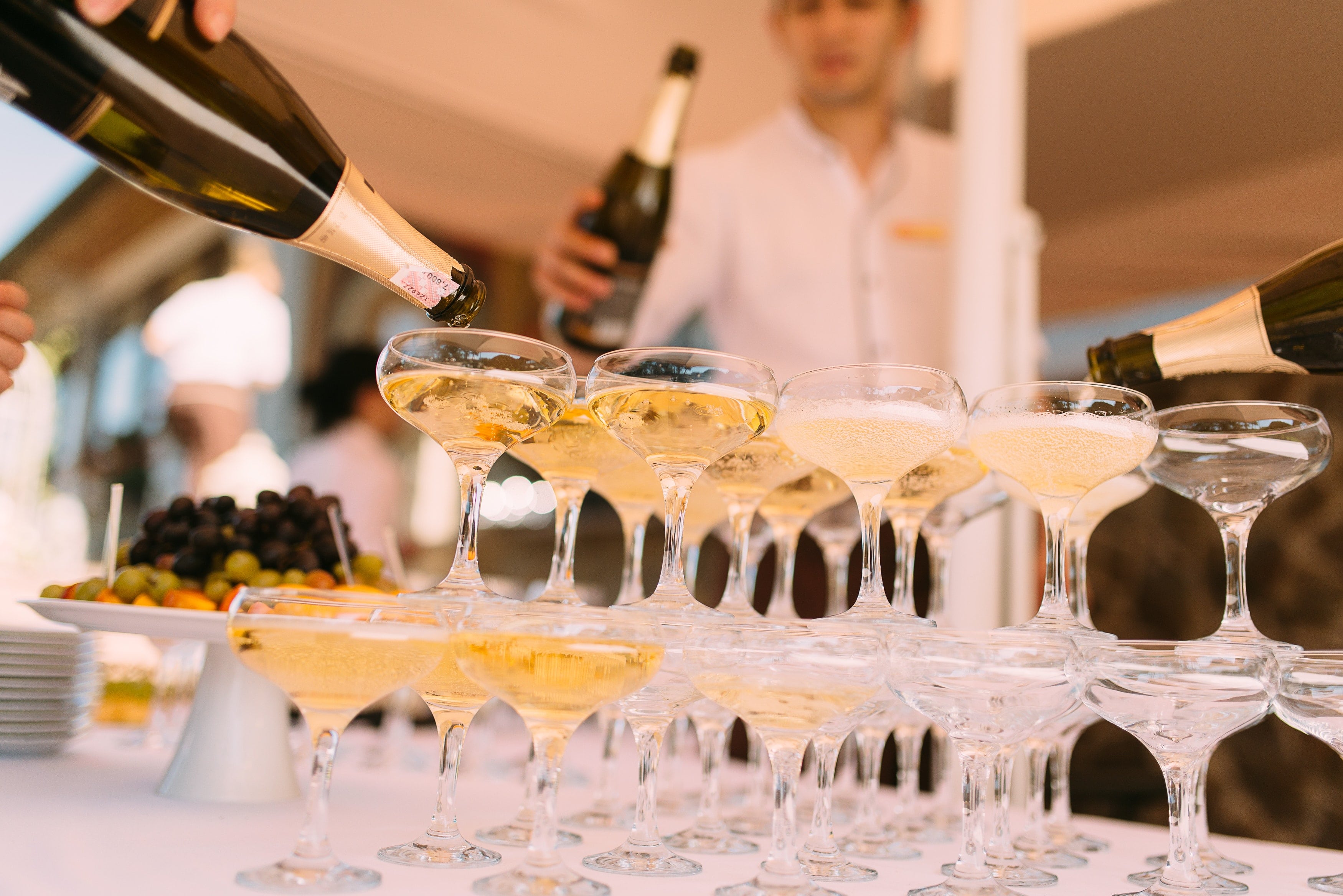 What is Champagne - Pouring Champagne in Champagne saucers